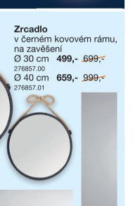 Zrcadlo v černém kovovém rámu